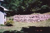 C N'R Lawn N' Landscape - Boulder Retaining Wall